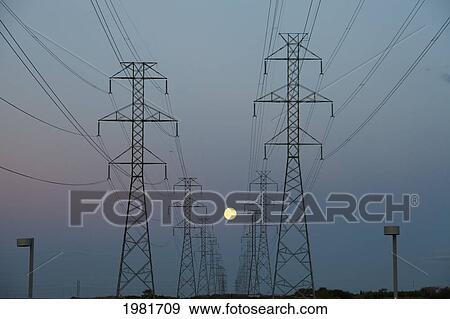 power transmission lines at dusk; beaumont alberta canada View Large Photo Image Stock Photo - power transmission lines at dusk; beaumont alberta canada. Fotosearch