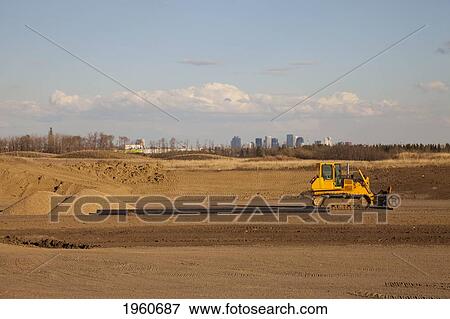 Stock Photo - road construction for a new highway; edmonton, alberta, canada. Fotosearch