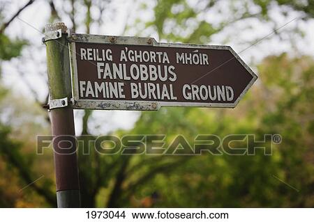 sign pointing to famine burial ground near dunmanway; county cork ireland View Large Photo Image Picture - sign pointing to famine burial ground near dunmanway; county cork ireland. Fotosearch