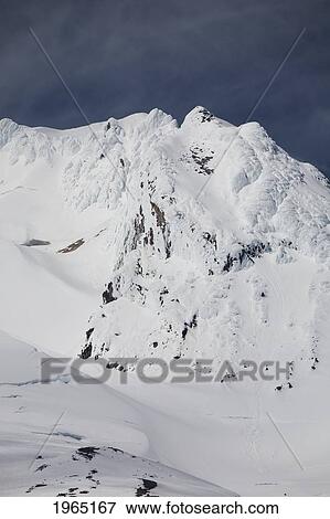 Stock Photo - snow covered mountain; oregon united states of america. Fotosearch