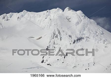 Stock Photograph - snow covered mountain; oregon united states of america. Fotosearch