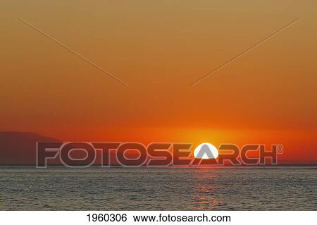sunrise over malaga bay; torremolinos, costa del sol, malaga province, spain View Large Photo Image Stock Photograph - sunrise over malaga bay; torremolinos, costa del sol, malaga province, spain. Fotosearch