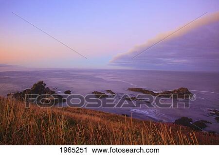 Stock Image - sunrise over yaquina head; oregon united states of america. Fotosearch