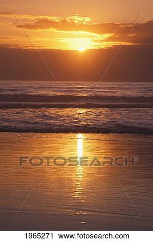 sunset over the pacific ocean along the oregon coast; oregon united states of america View Large Photo Image Stock Image - sunset over the pacific ocean along the oregon coast; oregon united states of america. Fotosearch