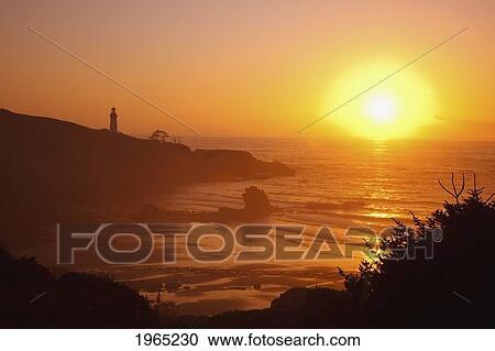 Stock Image - sunset over yaquina head lighthouse; newport oregon united states of america. Fotosearch