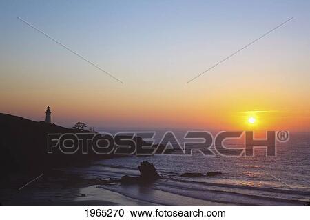 sunset over yaquina head lighthouse; newport oregon united states of america View Large Photo Image Stock Image - sunset over yaquina head lighthouse; newport oregon united states of america. Fotosearch