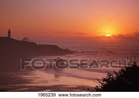 sunset over yaquina head lighthouse; newport oregon united states of america View Large Photo Image Stock Photo - sunset over yaquina head lighthouse; newport oregon united states of america. Fotosearch