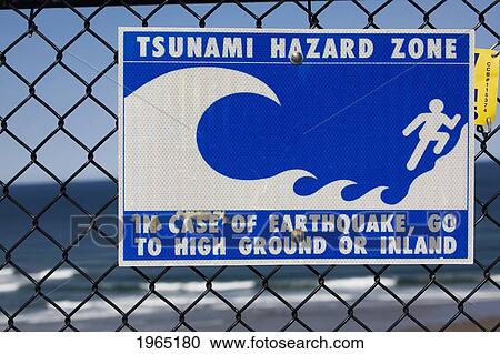 tsunami warning sign on a fence with the ocean in the background; lincoln city oregon united states of america View Large Photo Image Stock Image - tsunami warning sign on a fence with the ocean in the background; lincoln city oregon united states of america. Fotosearch