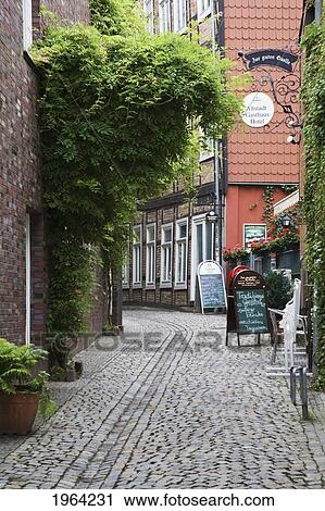 view of signs outside shops on a street; scherwin, mecklenburg, germany View Large Photo Image Stock Image - view of signs outside shops on a street; scherwin, mecklenburg, germany. Fotosearch