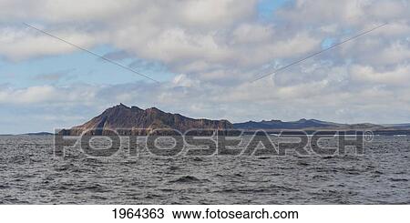 Stock Image - view of the islands over the pacific ocean; san cristobal island, galapagos, equador. Fotosearch