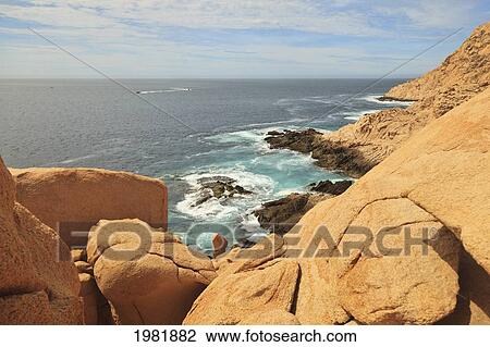 Stock Image - view of the rugged coastline and ocean in the los cabos area; baja california sur mexico. Fotosearch