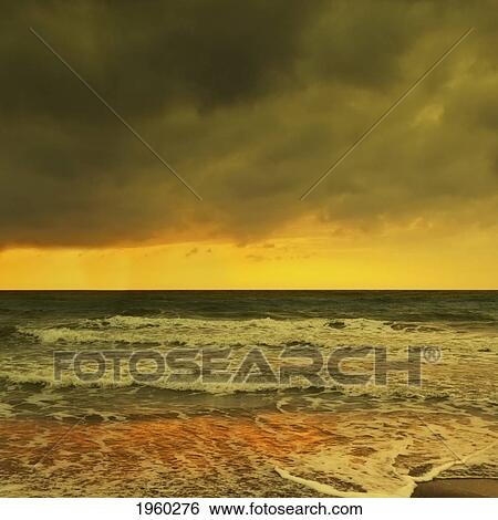 waves breaking on a wintery beach at dawn; spain View Large Photo Image Stock Photograph - waves breaking on a wintery beach at dawn; spain. Fotosearch