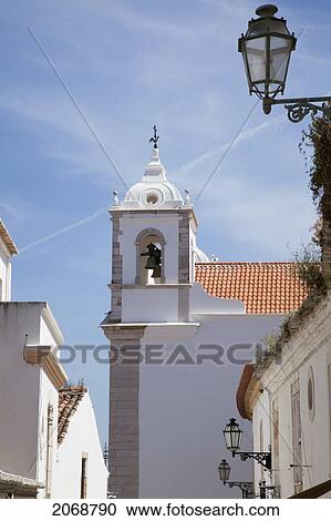 A Bell Tower In A White Building; Lagos Algarve Portugal View Large Photo Image Stock Image - A Bell Tower In A White Building; Lagos Algarve Portugal. Fotosearch