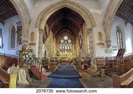 A blue carpet leads down the centre of a church towards stained glass windows; whittingham northumberland england View Large Photo Image Stock Photography - A blue carpet leads down the centre of a church towards stained glass windows; whittingham northumberland england. Fotosearch