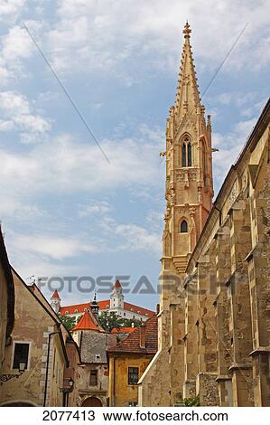 A church building and a view of bratislava castle from the old town; bratislava slovakia View Large Photo Image Stock Image - A church building and a view of bratislava castle from the old town; bratislava slovakia. Fotosearch