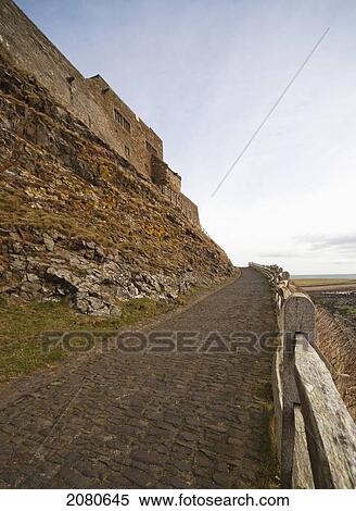 A cobblestone path along the coast; lindisfarne northumberland england View Large Photo Image Stock Photography - A cobblestone path along the coast; lindisfarne northumberland england. Fotosearch
