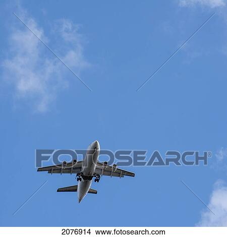 A commercial airplane in flight; stockholm sweden View Large Photo Image Picture - A commercial airplane in flight; stockholm sweden. Fotosearch