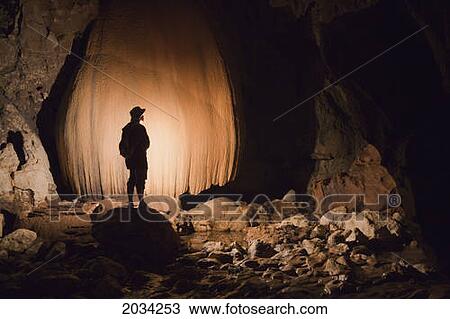 A Filipino Tour Guide Holds A Lantern Inside Sumaging Cave Or Big Cave Near Sagada; Luzon Philippines View Large Photo Image Stock Image - A Filipino Tour Guide Holds A Lantern Inside Sumaging Cave Or Big Cave Near Sagada; Luzon Philippines. Fotosearch