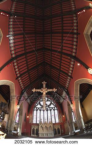 A Golden Crucifix Hanging Inside A Church; Northumberland England View Large Photo Image Stock Photography - A Golden Crucifix Hanging Inside A Church; Northumberland England. Fotosearch