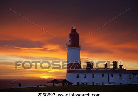 A Lighthouse At Sunset; Whitburn Tyne And Wear England View Large Photo Image Stock Photo - A Lighthouse At Sunset; Whitburn Tyne And Wear England. Fotosearch