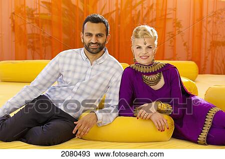 A mixed race couple posing with her wearing a purple sari; ludhiana punjab india View Large Photo Image Stock Image - A mixed race couple posing with her wearing a purple sari; ludhiana punjab india. Fotosearch