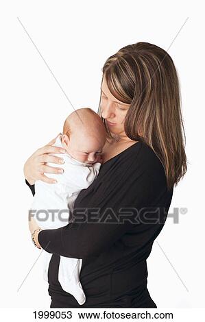 A Mother Cuddles With Her Newborn Baby; Dundas Minnesota United States Of America View Large Photo Image Stock Image - A Mother Cuddles With Her Newborn Baby; Dundas Minnesota United States Of America. Fotosearch