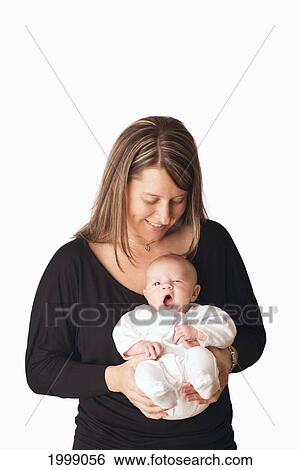 A Mother Holding A Newborn Baby; Dundas Minnesota United States Of America View Large Photo Image Stock Photograph - A Mother Holding A Newborn Baby; Dundas Minnesota United States Of America. Fotosearch