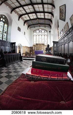 A Pile Of Hymn And Service Books On A Bench In A Church Staindrop
