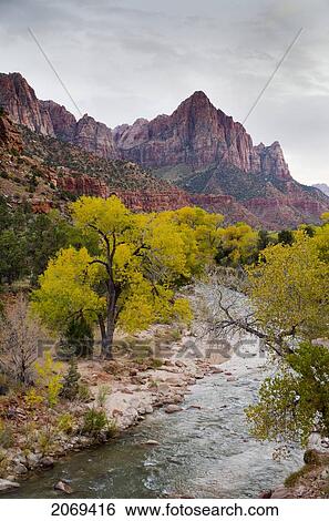 A Stream With Rugged Cliffs In The Distance; Arizona United States Of America View Large Photo Image Stock Photograph - A Stream With Rugged Cliffs In The Distance; Arizona United States Of America. Fotosearch