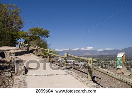 A Walking Path With A View Of The Pre-Cordillera Of The Andes; Mendoza Argentina View Large Photo Image Picture - A Walking Path With A View Of The Pre-Cordillera Of The Andes; Mendoza Argentina. Fotosearch