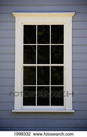 Stock Image - A Window With White Trim; Ladner British Columbia Canada. Fotosearch