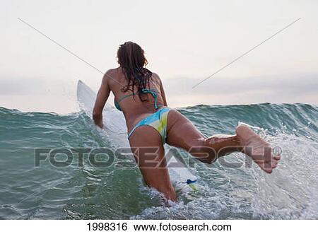 A Woman On A Surfboard; Tarifa Cadiz Andalusia Spain View Large Photo Image Stock Photograph - A Woman On A Surfboard; Tarifa Cadiz Andalusia Spain. Fotosearch