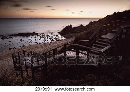 A wooden staircase leading down to the beach; tarifa cadiz andalusia spain View Large Photo Image Stock Image - A wooden staircase leading down to the beach; tarifa cadiz andalusia spain. Fotosearch
