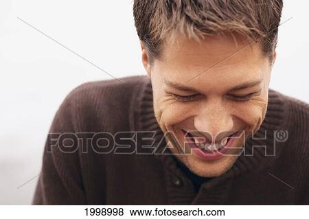 A Young Man Laughing; Spicer Minnesota United States Of America View Large Photo Image Stock Photo - A Young Man Laughing; Spicer Minnesota United States Of America. Fotosearch