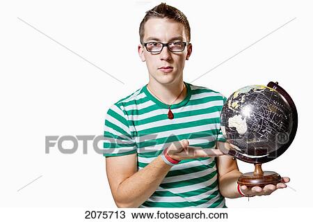A Young Man Showing Australia On A Globe View Large Photo Image Stock Image - A Young Man Showing Australia On A Globe. Fotosearch