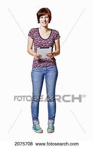 Stock Photo - A Young Woman Holding A Tablet Computer. Fotosearch
