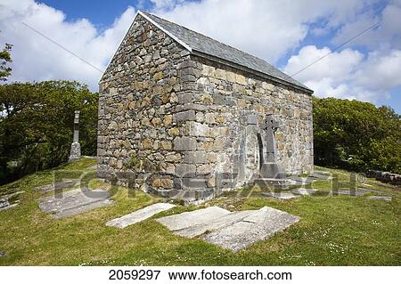Stock Photo - An Old Stone Building And Cemetery; Spiddal County Galway Ireland. Fotosearch