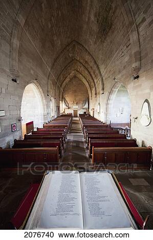 Stock Image - An open bible in the ladykirk church; ladykirk scottish border scotland. Fotosearch