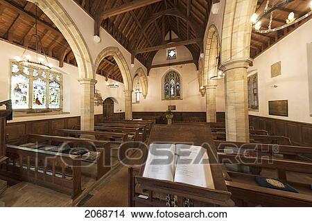 Picture - An Open Bible On A Podium At The Front Of A Church; Northumberland England. Fotosearch