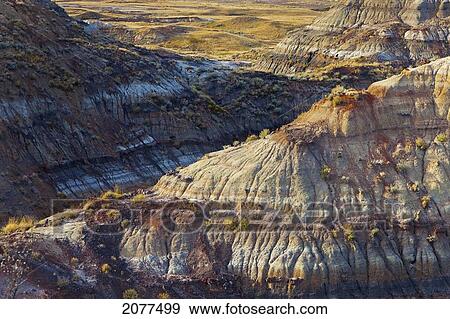 Arid hills in the badlands; drumheller alberta canada View Large Photo Image Stock Photo - Arid hills in the badlands; drumheller alberta canada. Fotosearch