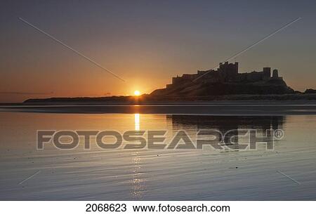 Bamburgh Castle Reflected In The Water At Sunset; Bamburgh Northumberland England View Large Photo Image Stock Image - Bamburgh Castle Reflected In The Water At Sunset; Bamburgh Northumberland England. Fotosearch