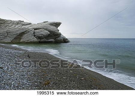 Beach With Unique Rock Formation In Forillon National Park; Quebec Canada View Large Photo Image Stock Photography - Beach With Unique Rock Formation In Forillon National Park; Quebec Canada. Fotosearch