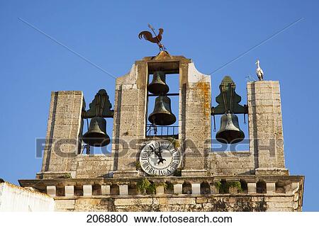 Bells And A Clock On The Top Of A Structure; Faro Algarve Portugal View Large Photo Image Stock Image - Bells And A Clock On The Top Of A Structure; Faro Algarve Portugal. Fotosearch