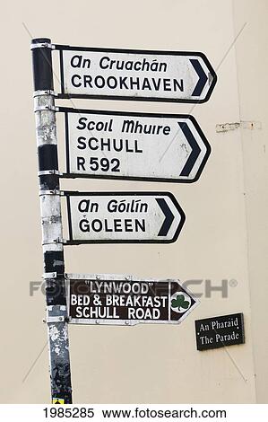 Bilingual Sign Post In Irish And English Languages; Ballydehob County Cork Republic Of Ireland View Large Photo Image Stock Photography - Bilingual Sign Post In Irish And English Languages; Ballydehob County Cork Republic Of Ireland. Fotosearch