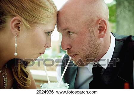 Bride And Groom Drinking From A Shared Milkshake; Grand Junction Colorado United States Of America View Large Photo Image Stock Photograph - Bride And Groom Drinking From A Shared Milkshake; Grand Junction Colorado United States Of America. Fotosearch