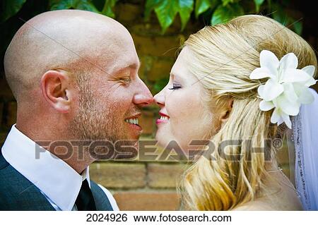 Bride And Groom Eskimo Kiss; Grand Junction Colorado United States Of America View Large Photo Image Stock Photograph - Bride And Groom Eskimo Kiss; Grand Junction Colorado United States Of America. Fotosearch