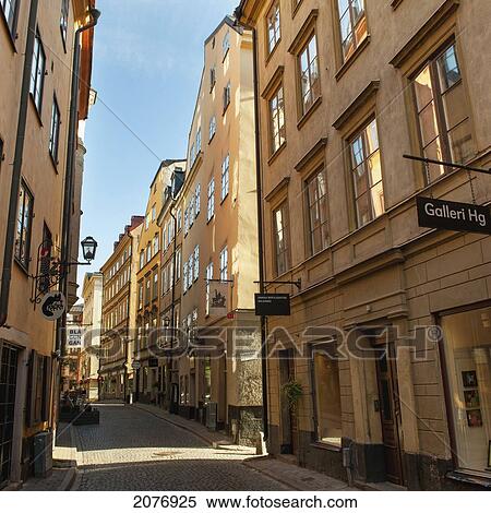 Stock Photography - Buildings along a narrow street in old town; stockholm sweden. Fotosearch