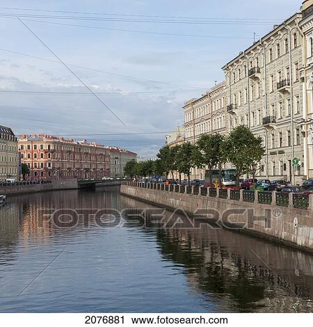 Stock Image - Buildings and cars along the moyka river; st. petersburg russia. Fotosearch