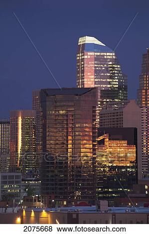 Calgary Skyline At Dawn With City Lights And Deep Blue Sky With Buildings Reflecting The Orange Glow Of Sunrise; Calgary Alberta Canada View Large Photo Image Stock Photo - Calgary Skyline At Dawn With City Lights And Deep Blue Sky With Buildings Reflecting The Orange Glow Of Sunrise; Calgary Alberta Canada. Fotosearch