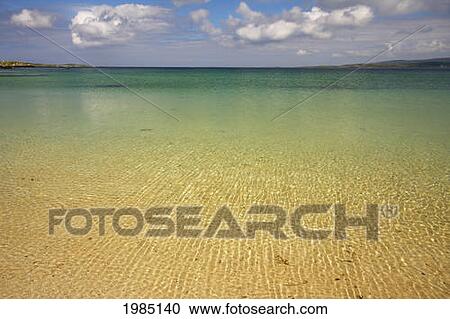 Stock Image - Clear Waters At Ballyconneely Beach In The Connemara Region; County Galway Ireland. Fotosearch